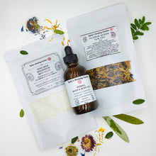 Load image into Gallery viewer, A 3-pack of products, inlcuding "Goat Milk Magnesium Bath Salts", "Herbal Bath and Body Oil" and "Flower Queen Tub Tea".